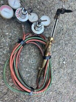 Harris cutting torch, with hoses and gauges, journeyman