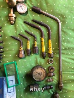 Lot of welding torches tips cutting heads gauges fittings tempilstiks nu & used