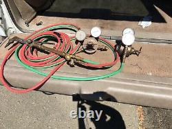 Oxygen acetylene cutting torch including regulators and welding hoses
