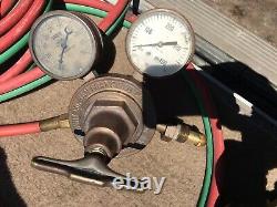 Oxygen acetylene cutting torch including regulators and welding hoses
