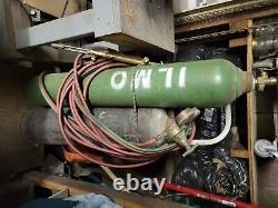 Used oxygen acetylene tanks with regulators, hoses, torch tips, and cart included